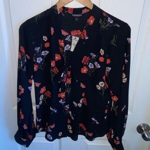 NWT Women’s Express Blouse with tie detail in black with multi colors in size M